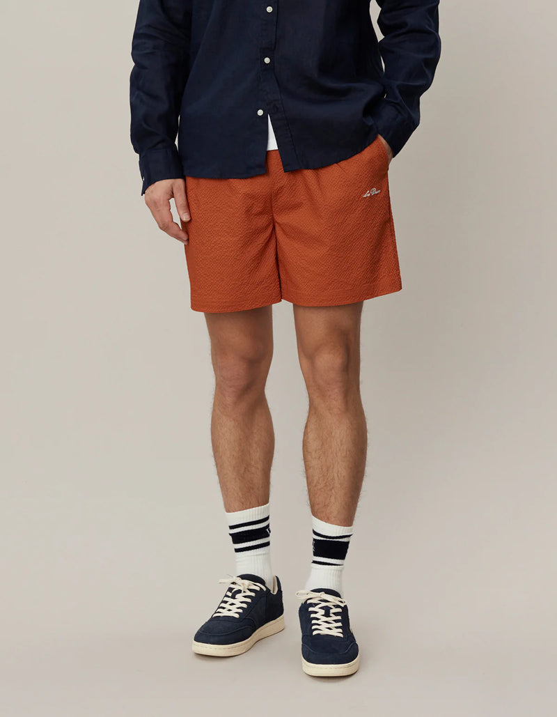 Stan Seersucker Swim Shorts - Court Orange